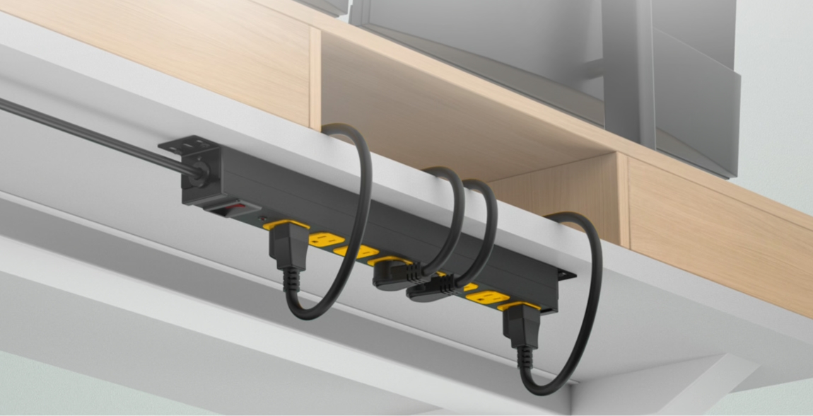 CRST power strip mounted under a desk with a bracket