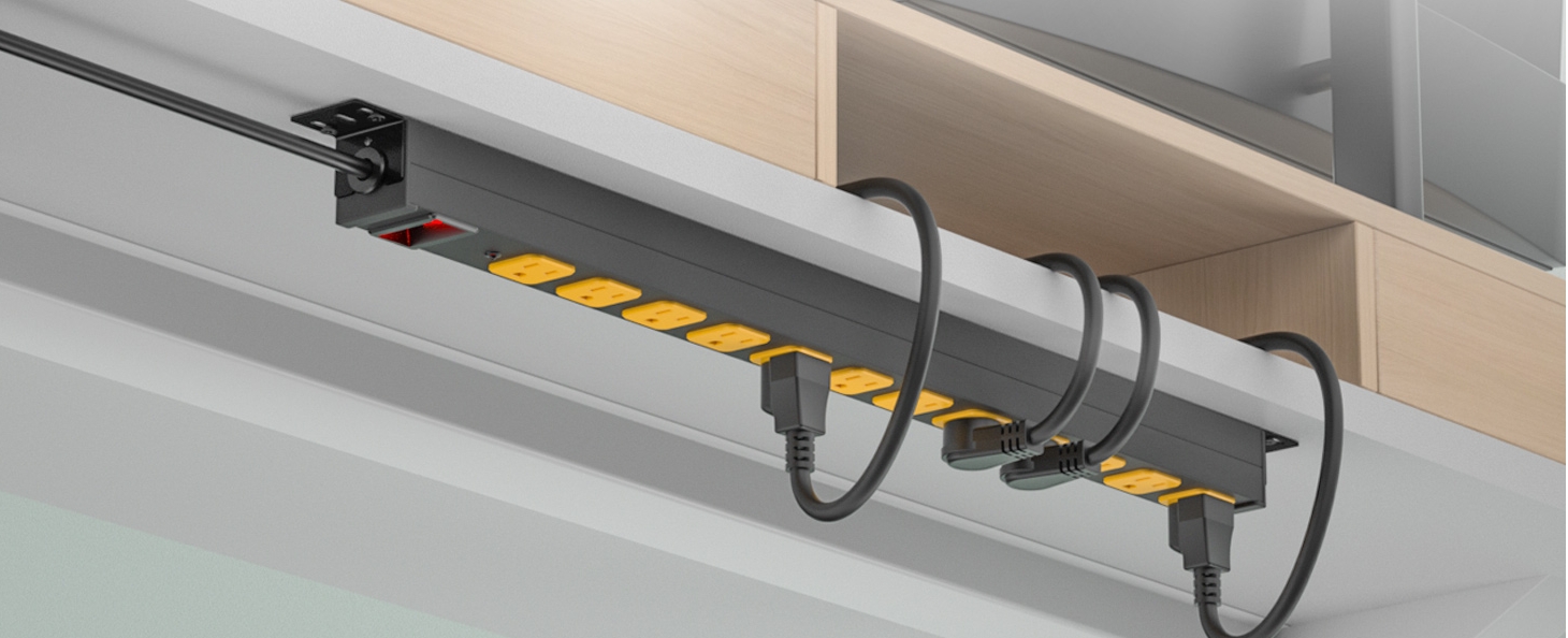 CRST power strip mounted under a desk with routed cables