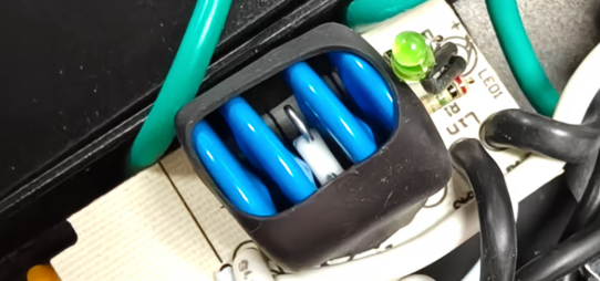 Four thermal-protected MOVs in a fire-retardant sleeve